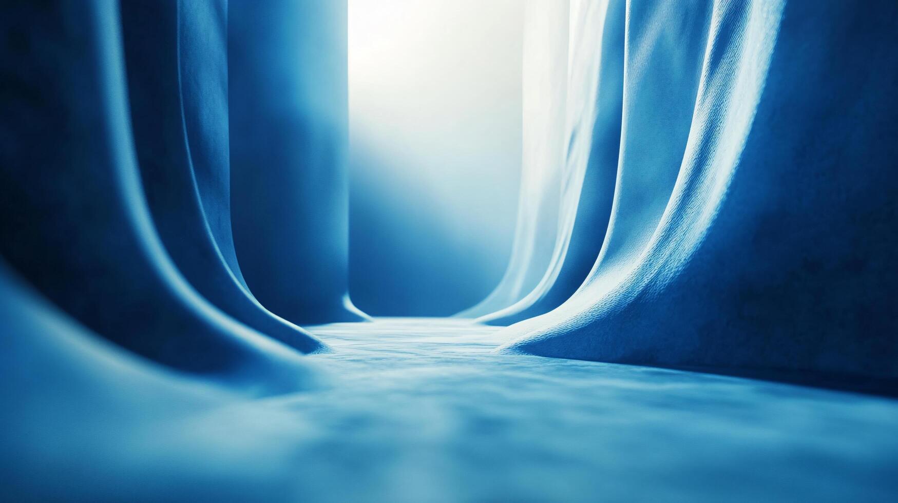 A blue tunnel with a light shining through it photo
