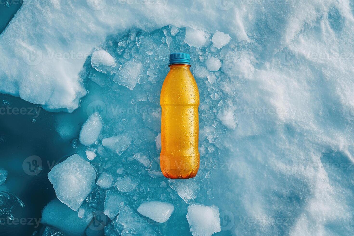 Yellow plastic bottle cooling on ice in arctic environment photo