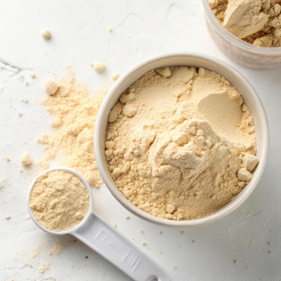 Top View of Protein Powder in a Bowl on a White Background photo