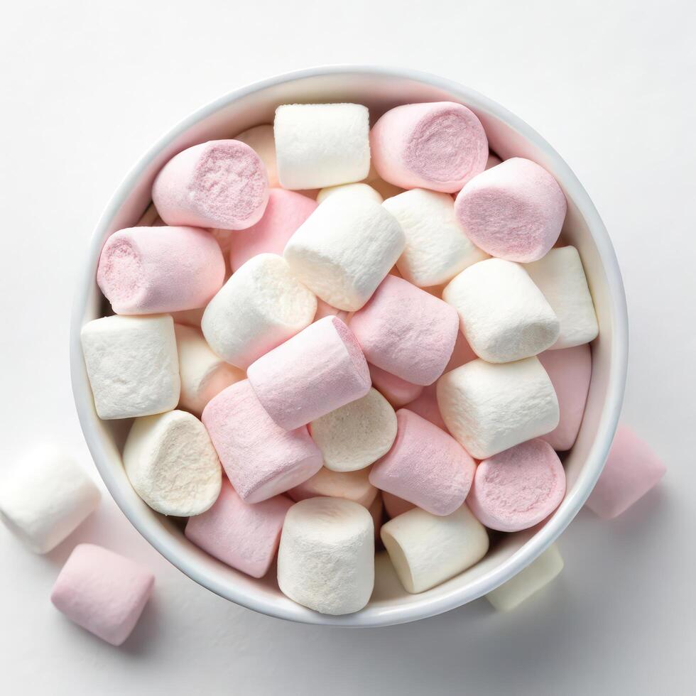 Top View of Mini Marshmallows in a Bowl on a White Background photo
