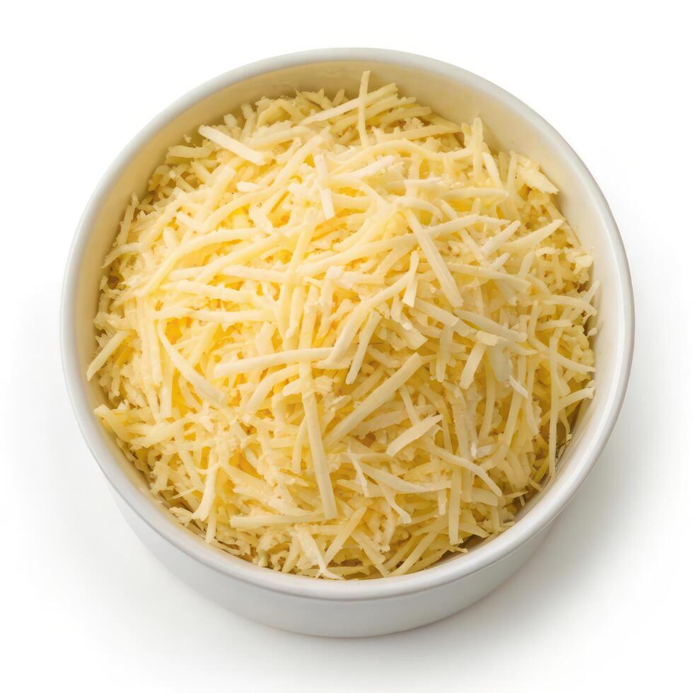 Top View of Grated Cheese in a Bowl on a White Background photo