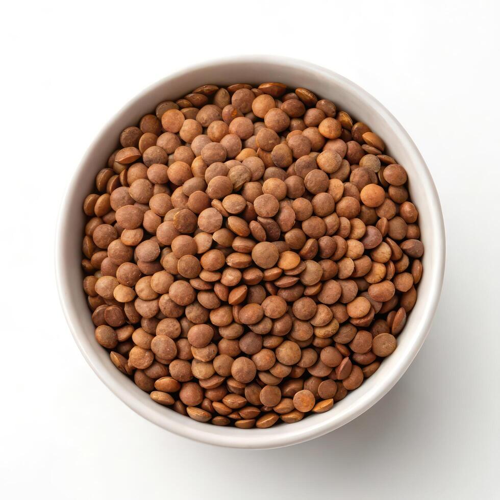Top View of Cooked Lentils in a Bowl on a White Background photo