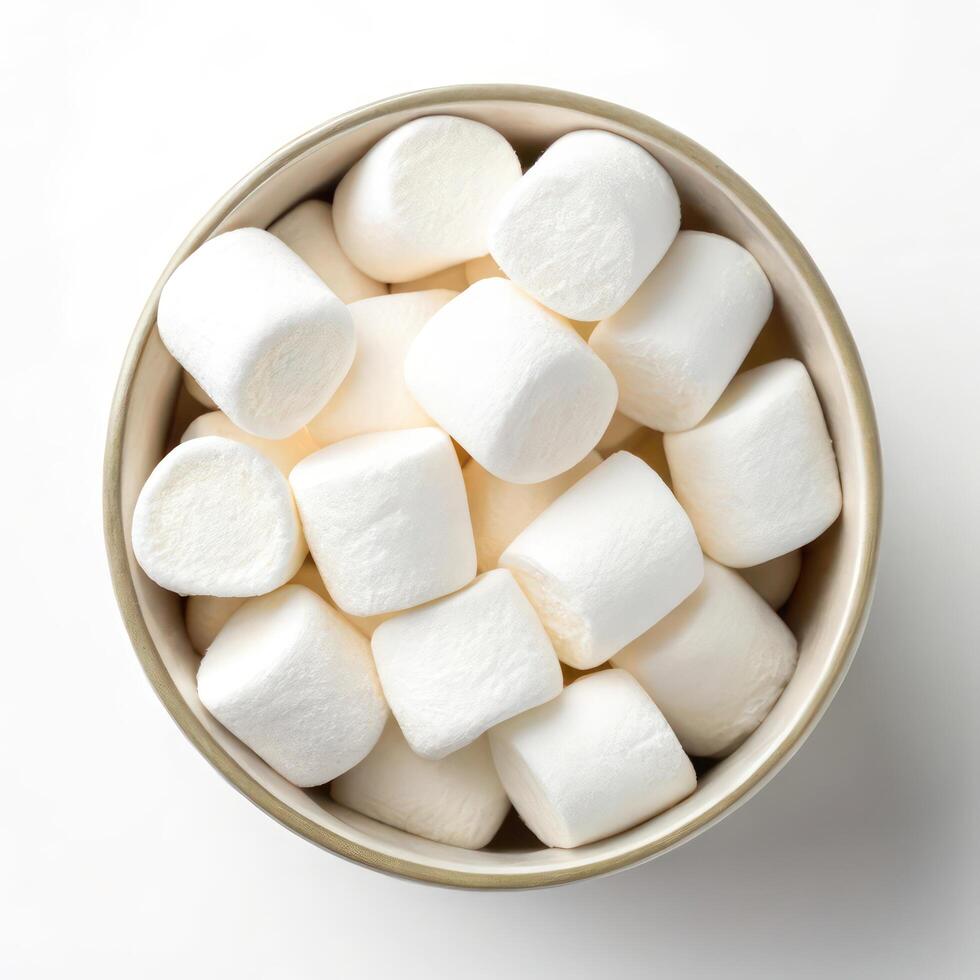 Top View of White Marshmallows in a Bowl on White Background photo
