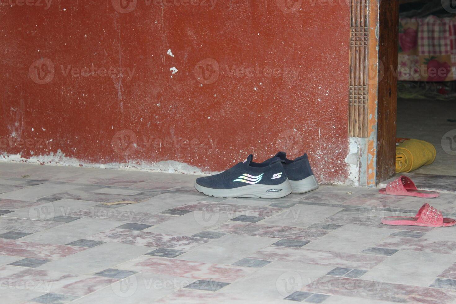 A pair of shoes on the floor photo
