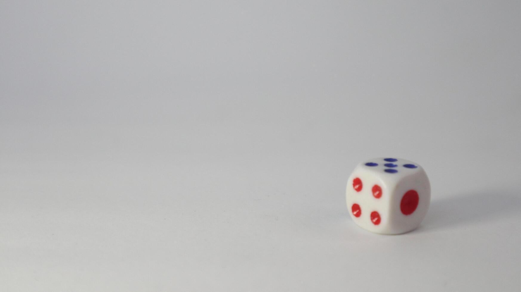 a photo of a dice with the numbers 4, 5, and one visible in the photo and can be used as a background