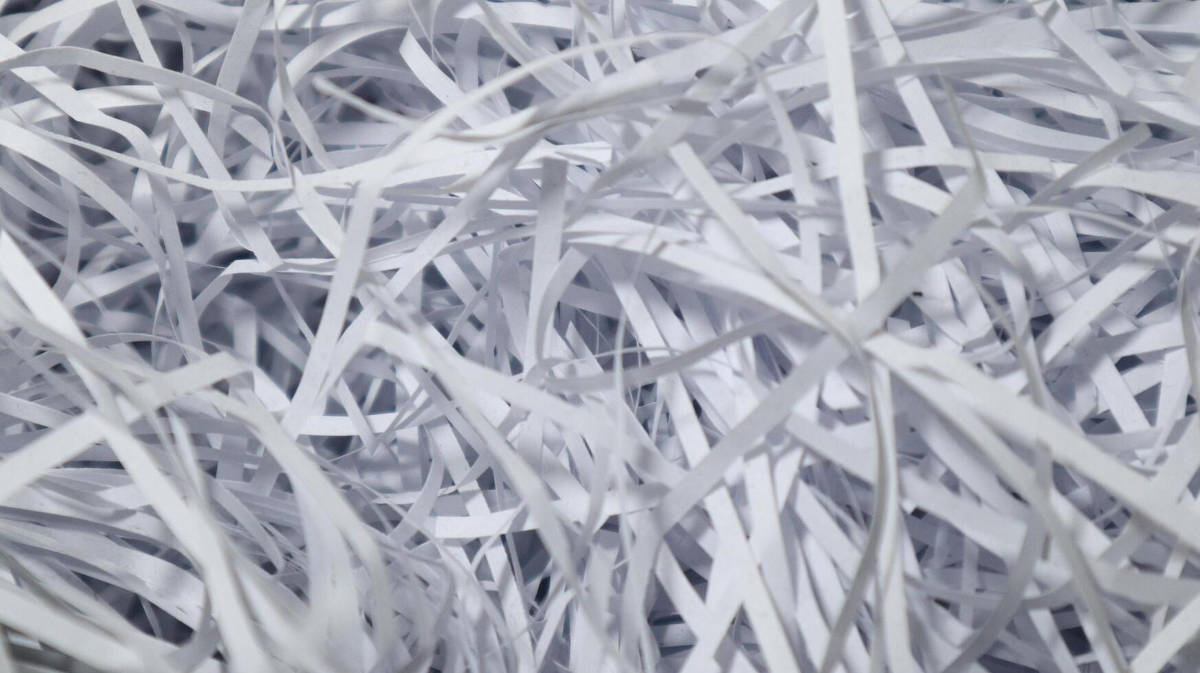 a photo of shredded paper that will be used as a shock absorber on packages