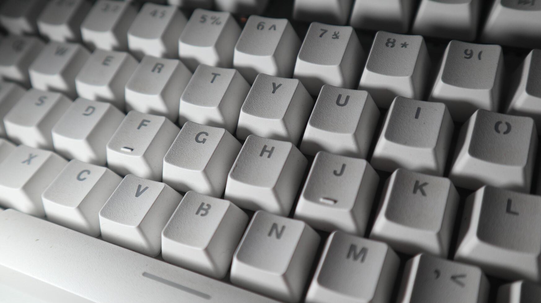 a close up photo of a computer keyboard
