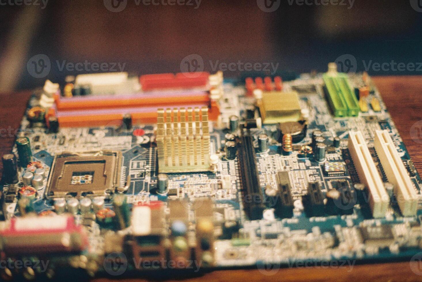An image displaying a Circuit Board hosting a variety of Electronic Elements photo