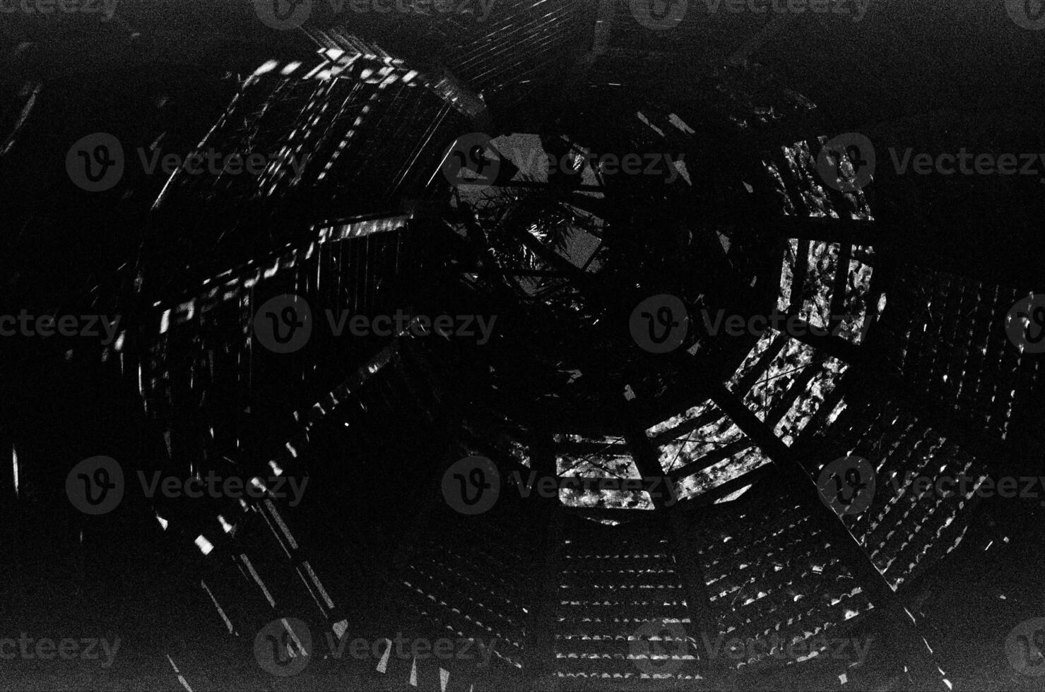 Spider web image in black white with keywords tire, lighting, building photo