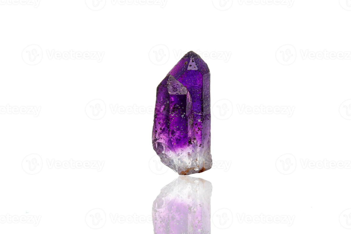macro mineral stone amethyst on a white background close up photo