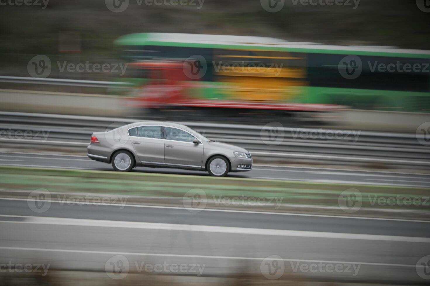 colors, passenger car on the highway in motion with a blurred background photo