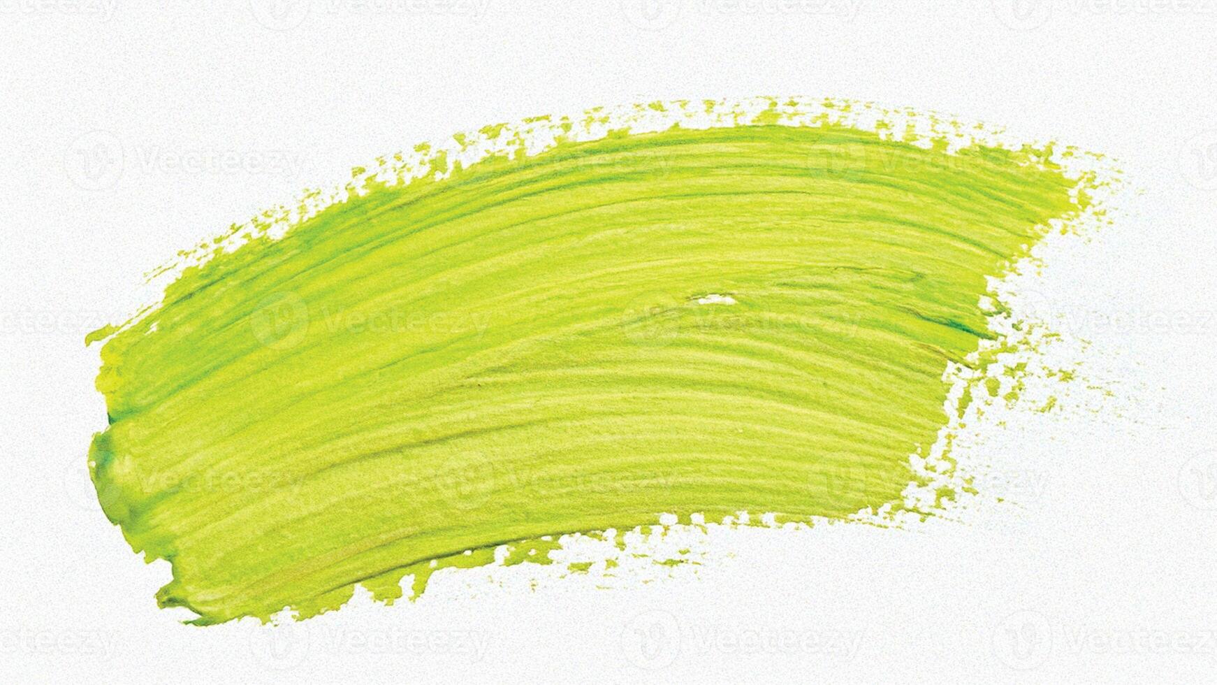 Yellow-green wide brush stroke with textured finish. photo