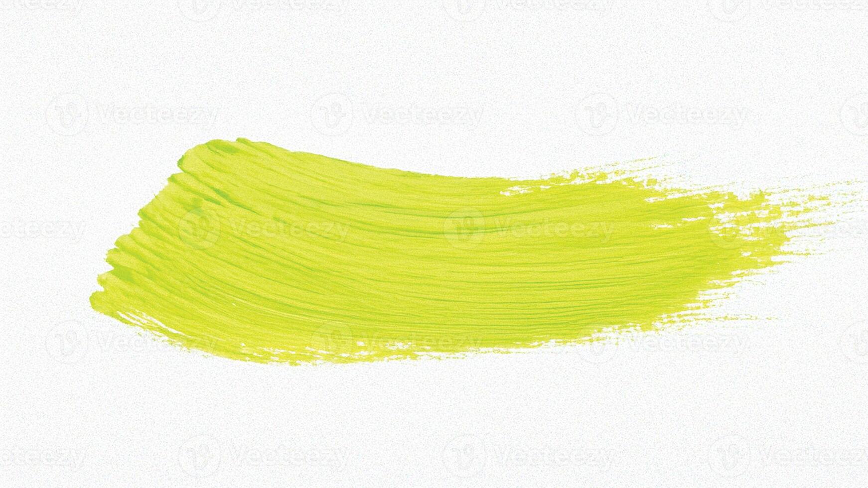 Bright yellow brush stroke with rough uneven edges. photo
