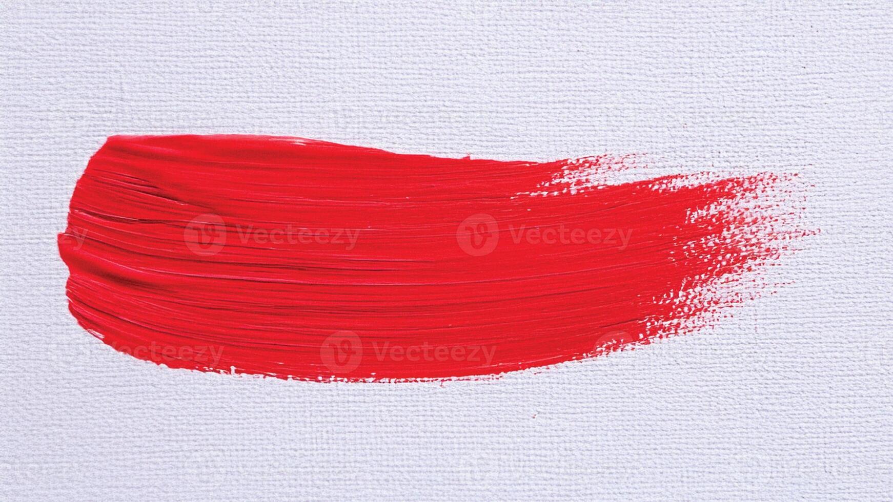 Bright red streak with flowing lines and soft paint texture. photo