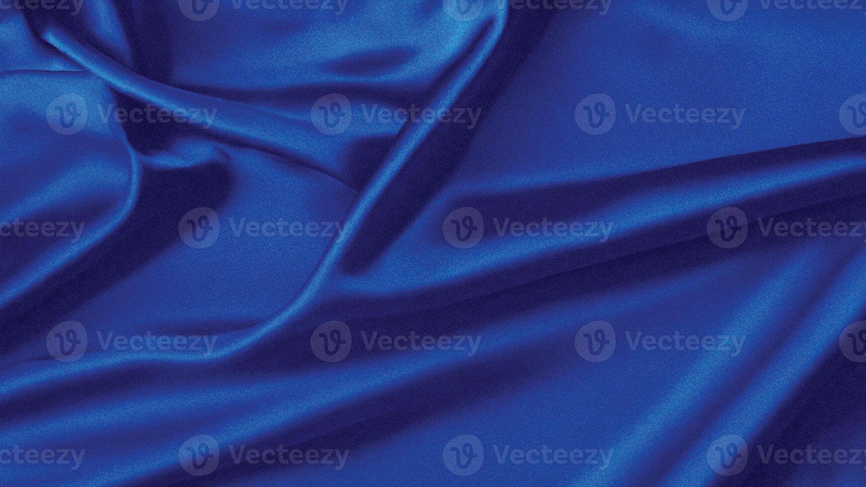 Luxurious royal blue silk fabric background with smooth, flowing folds creating elegant waves and light reflections for fashion, decor, or design projects. photo