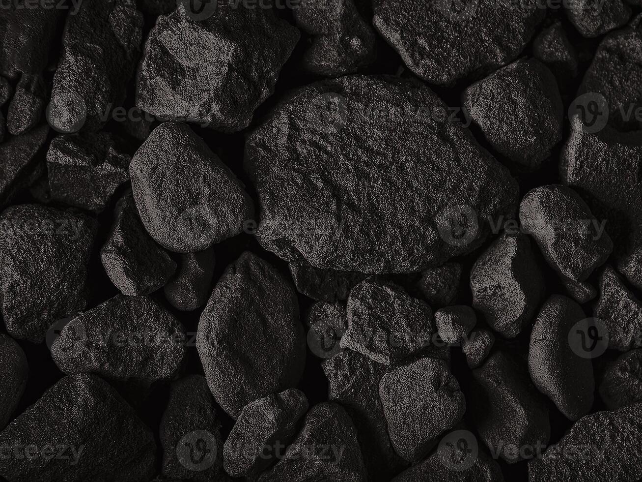 Textured abstract background with dark stones and natural elements in close-up view photo