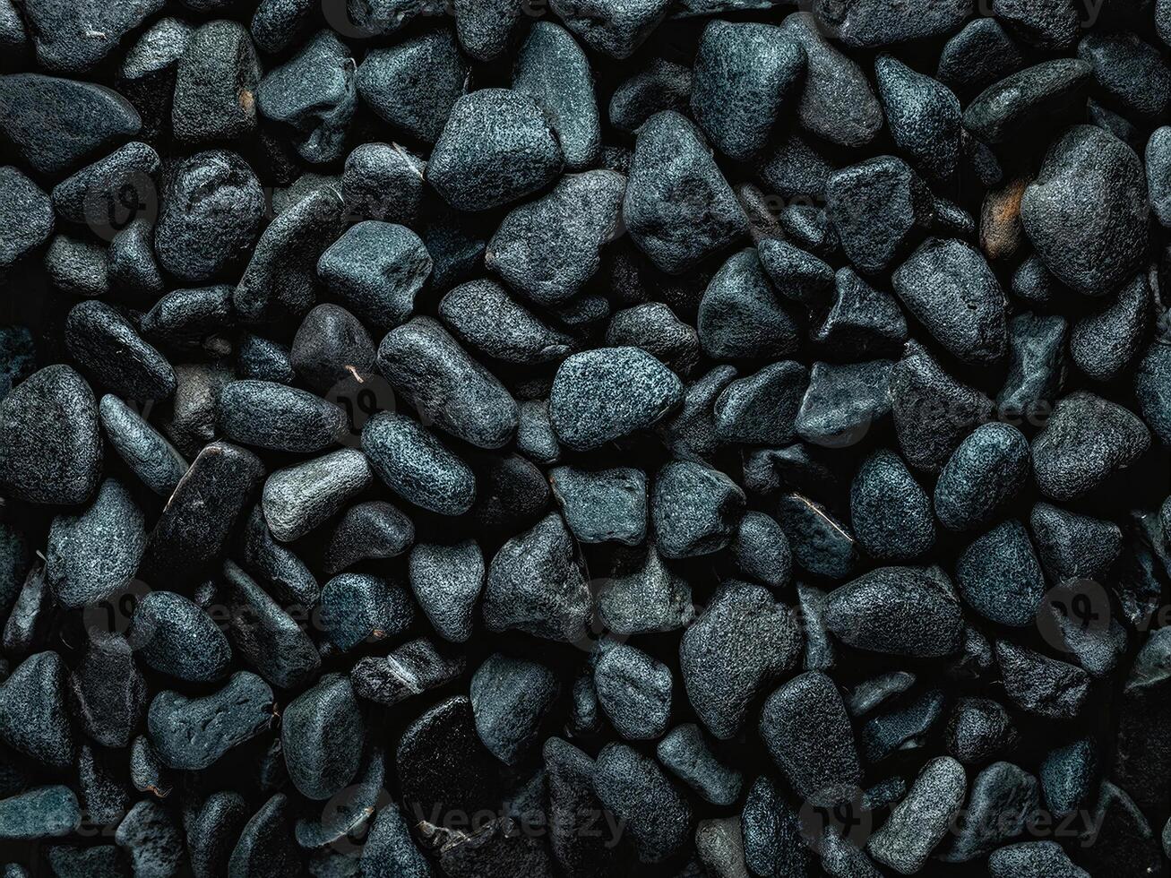 Captivating abstract background featuring dark textured pebbles in natural arrangement photo