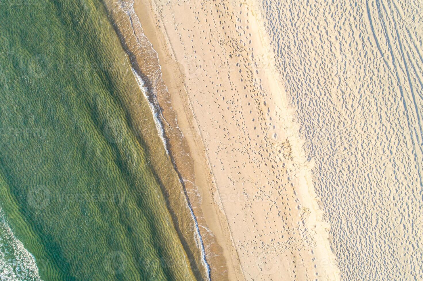 directly above view of beach with vibrant turquoise water, aerial drone view concept tranquility background photo