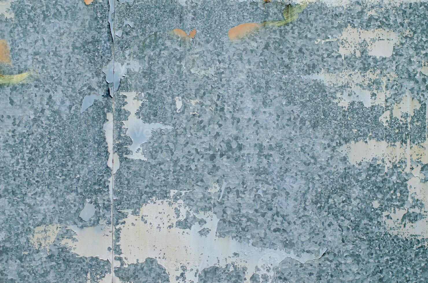 detail of a sheet metal door weathered, textured background for design photo