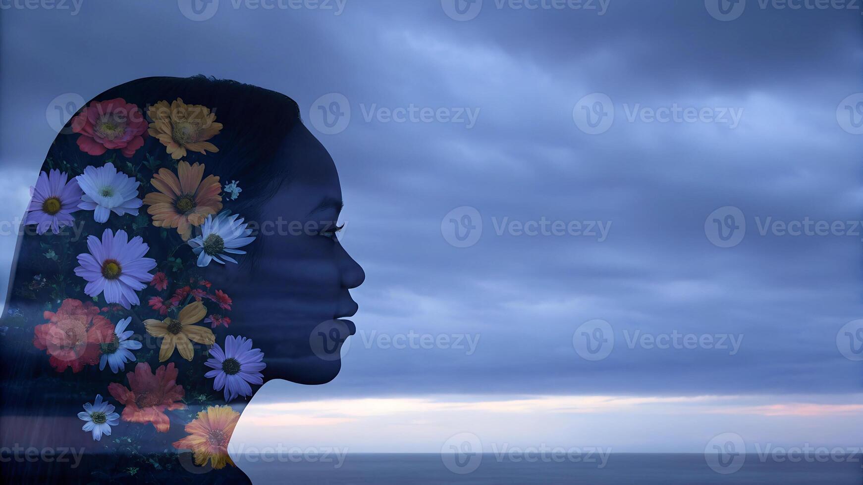 Double exposure of a woman with floral patterns against a cloudy sky. Serenity and self-reflection concept photo