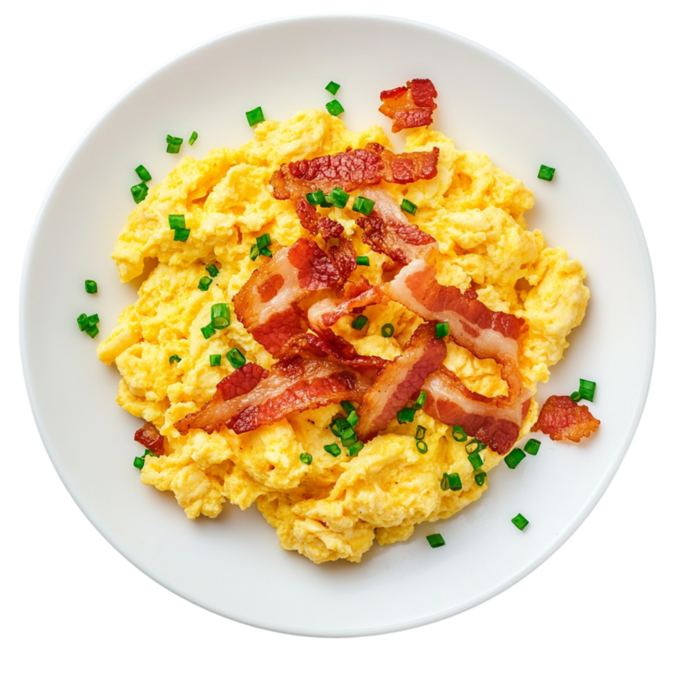 Fluffy scrambled eggs with crispy bacon pieces and finely chopped chives symbolize hearty breakfasts proteinrich meals and homemade comfort food png