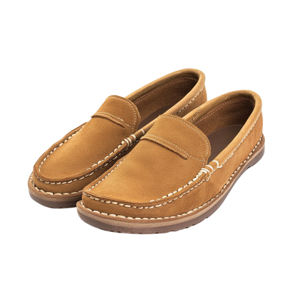 Brown leather loafers neatly positioned with a stitched design and a classic look representing timeless style durability and the preference for elegant footwear in professional and casual settings png