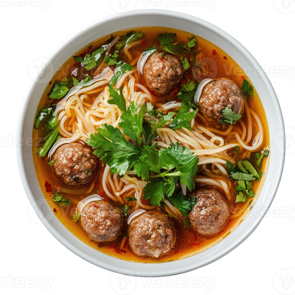 Delicious bakso meatball soup with noodles and fresh herbs served in a bowl png