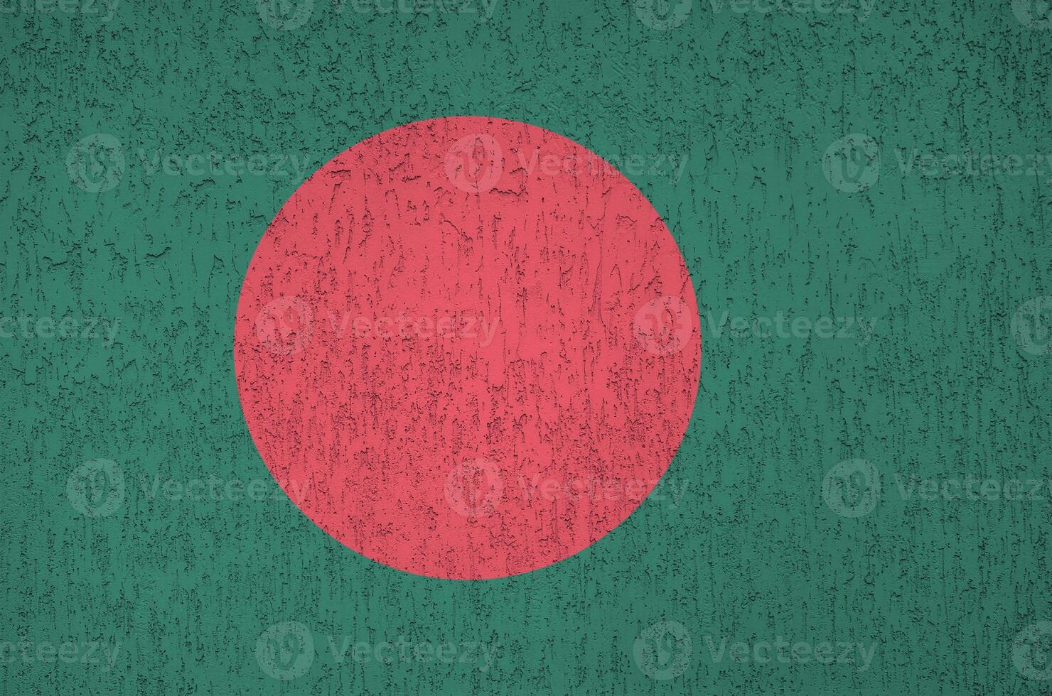 Bangladesh flag depicted in bright paint colors on old relief plastering wall. Textured banner on rough background photo