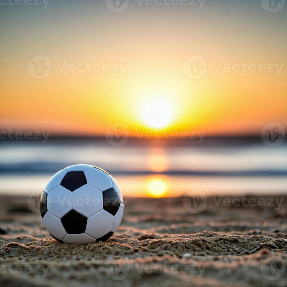 A soccer ball on the beach at sunset photo