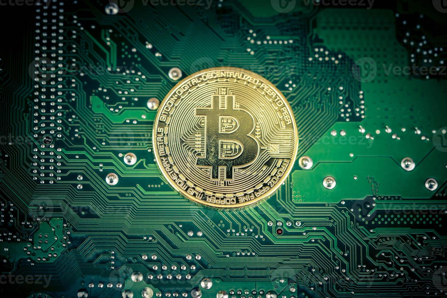Cryptocurrency on a computer mother board photo