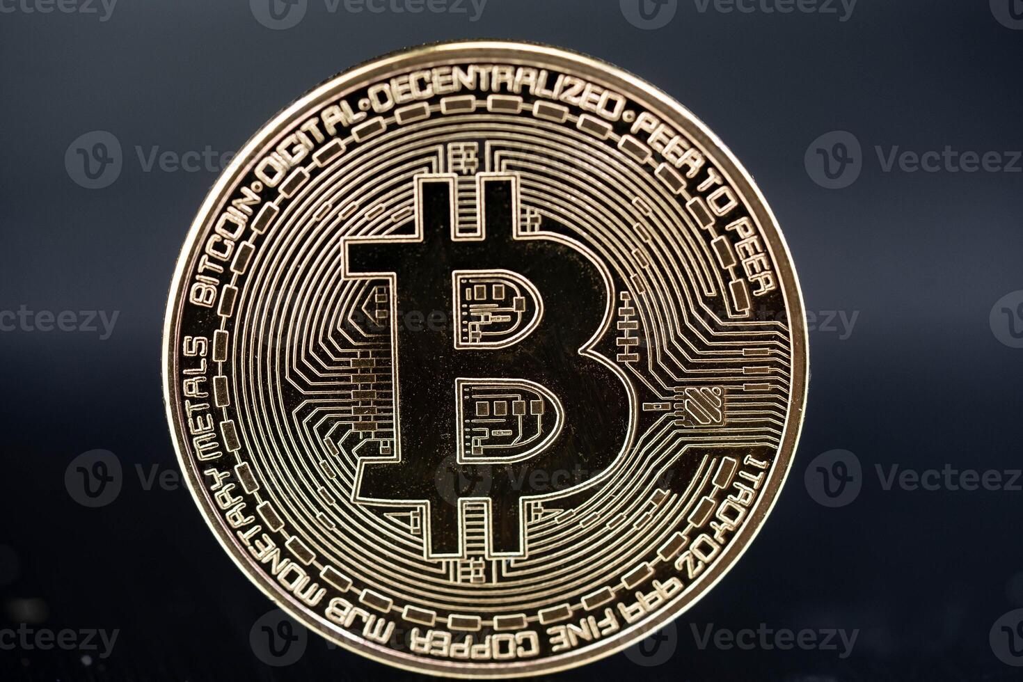 on bitcoin on a black background photo