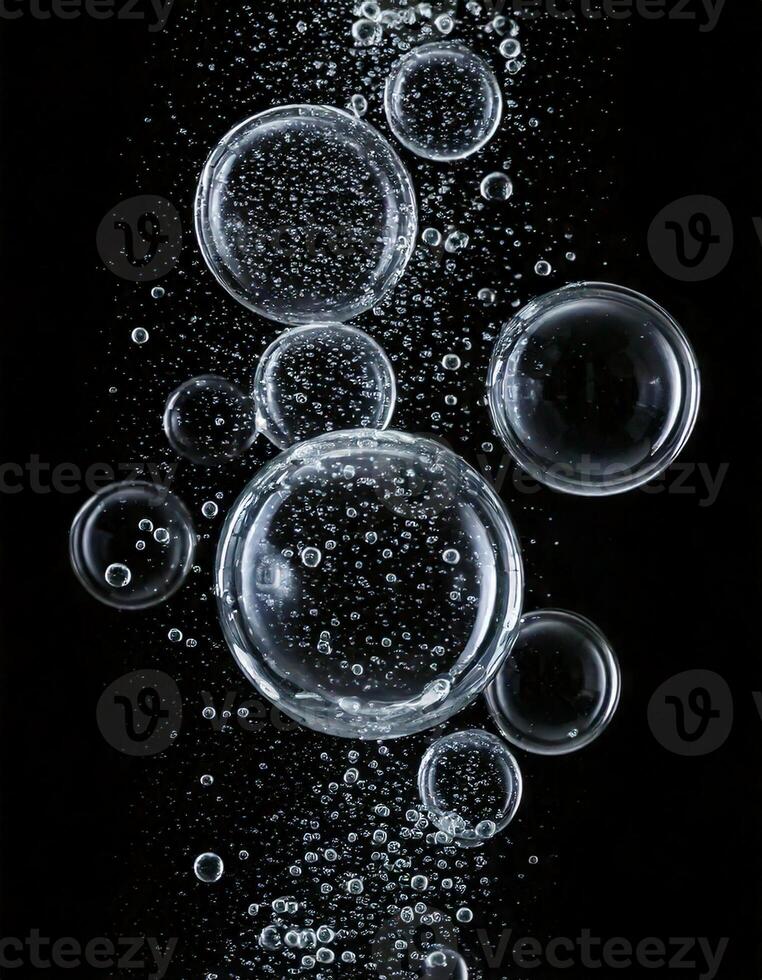 Clear bubbles in a black background photo