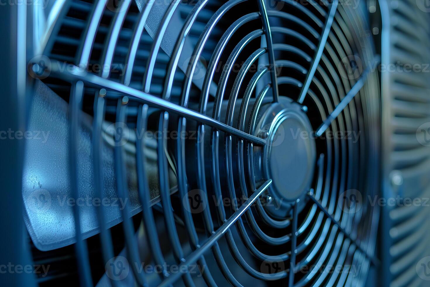 Industrial fan blades rotating inside ventilation system photo
