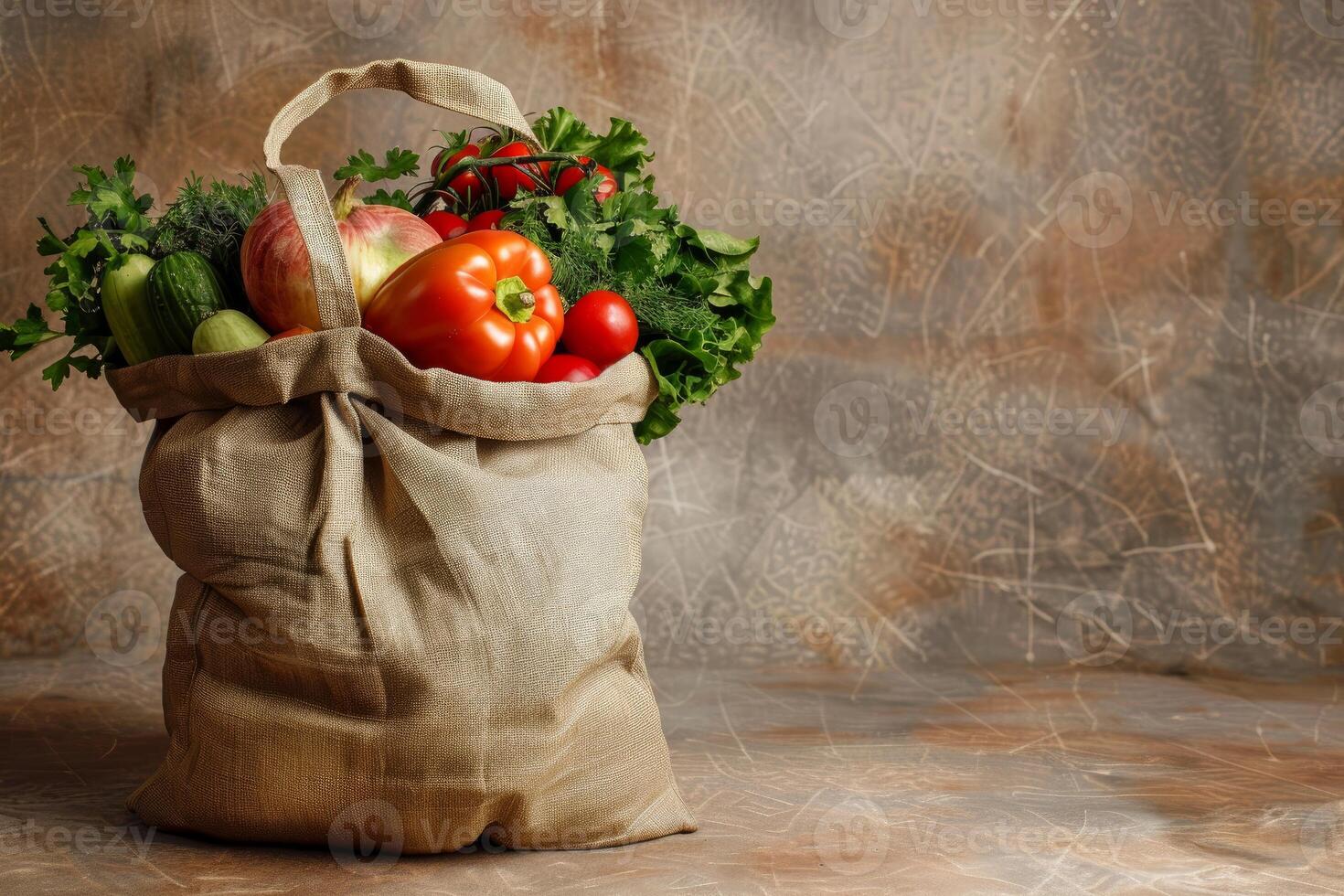 Full reusable grocery shopping bag with fresh vegetables on table photo
