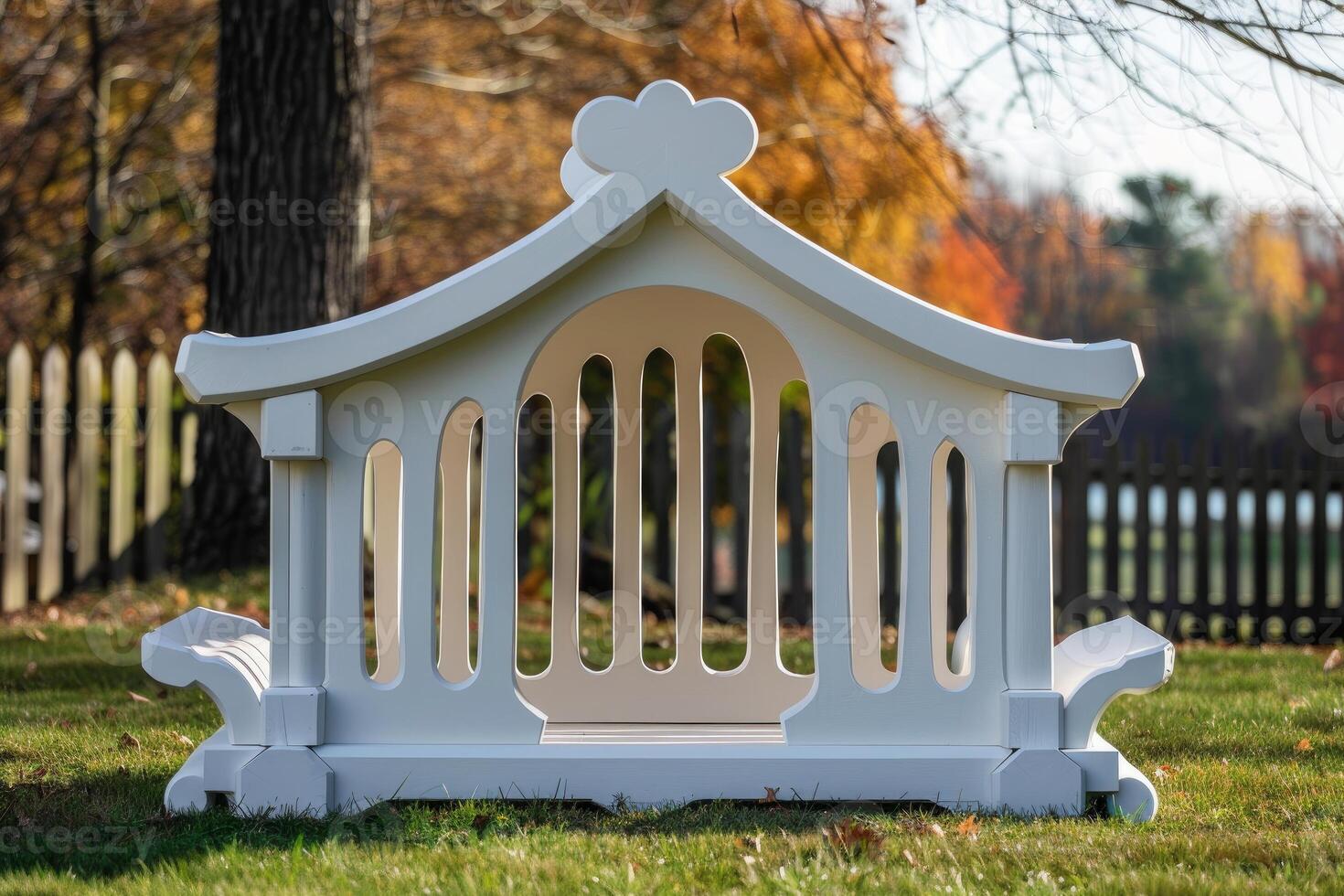 White wooden bench featuring asian style roof in autumn garden photo