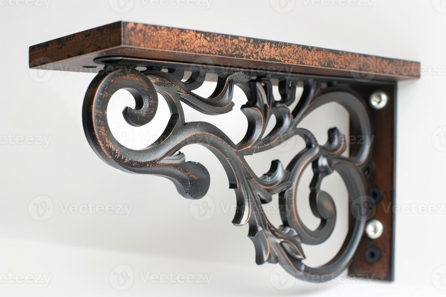Decorative metal shelf bracket with ornate design supporting wooden shelf photo