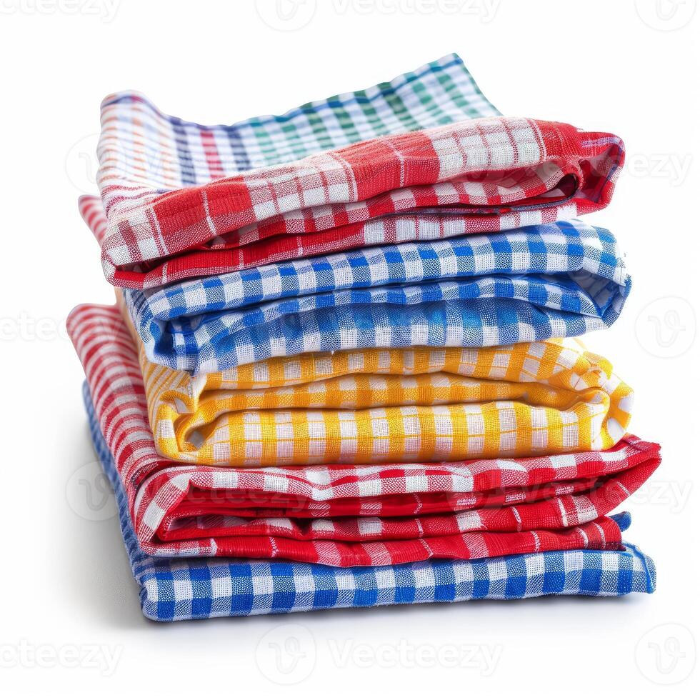 Stack of colorful checked napkins isolated on white background photo