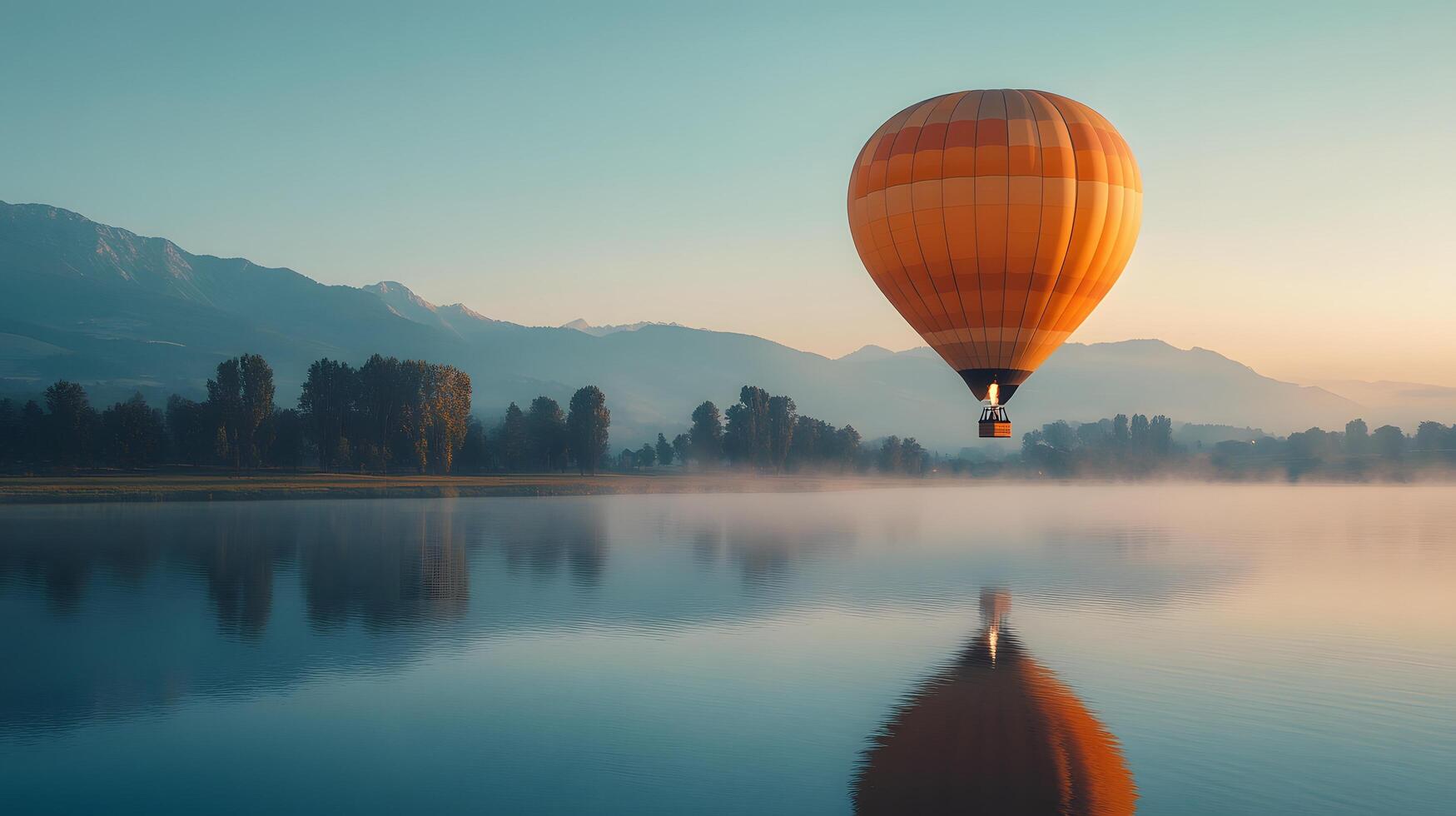 Hot air balloon floating above a mountain lake at dawn, capturing perfect reflection in calm waters with pastel sunrise colors and dreamy morning mist in a panoramic view. water photo