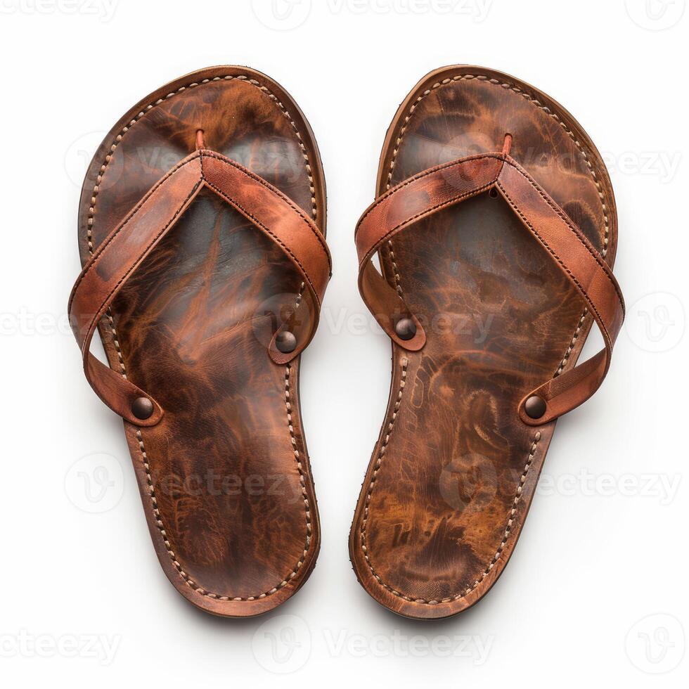 Leather sandals isolated on white background, showing handcrafted summer footwear photo