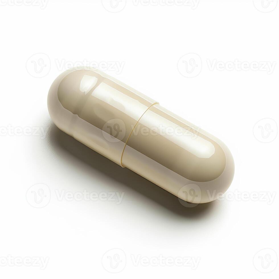 Single beige medical capsule lying on white background photo
