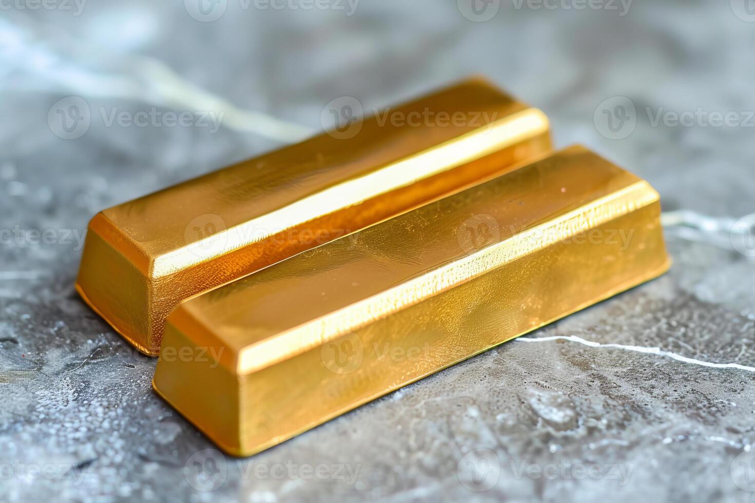Two gold bars resting on marble surface representing investment and wealth photo