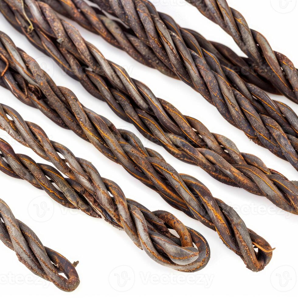 Rusty twisted metal wires showing corrosion on white background photo