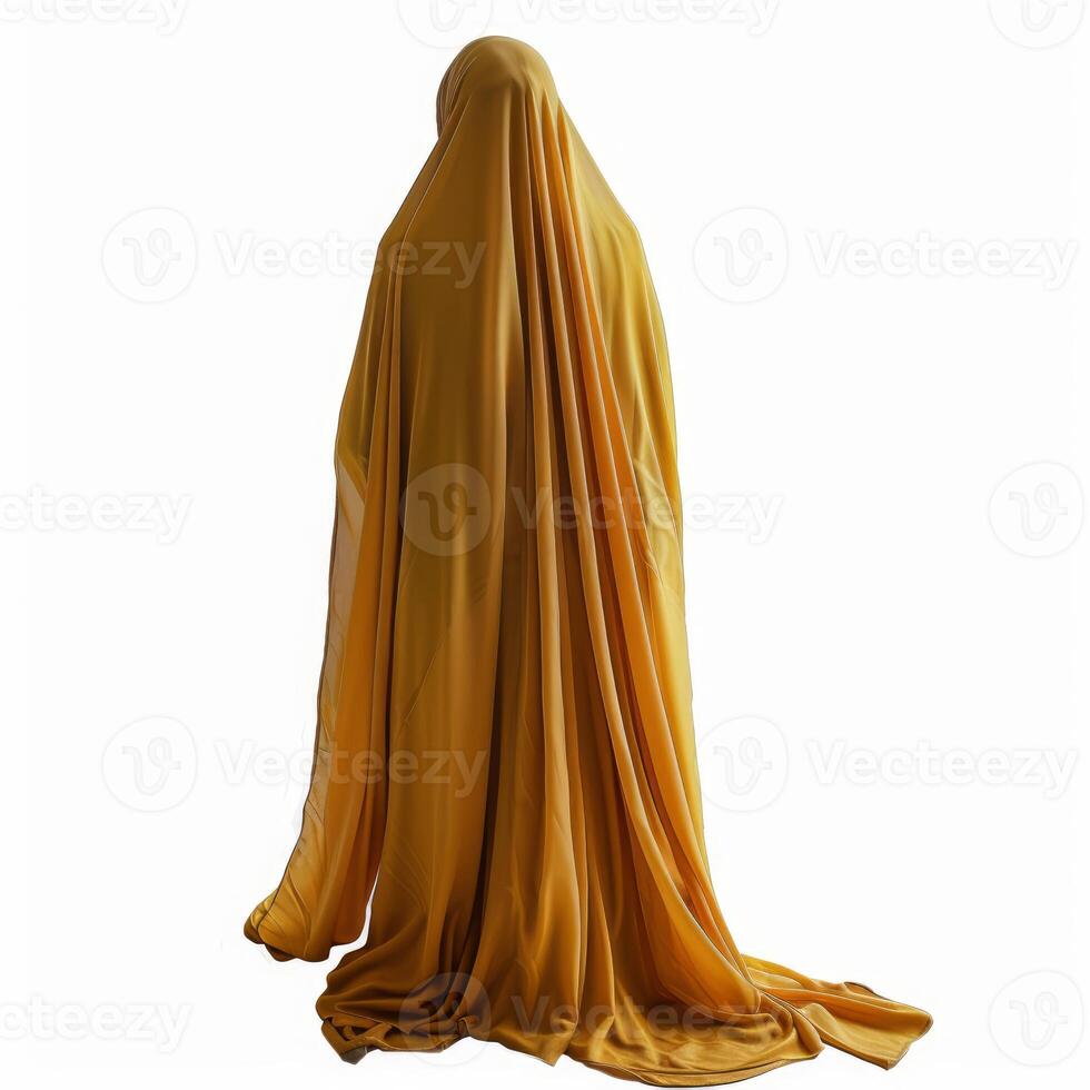 Person standing covered by yellow cloth on white background photo