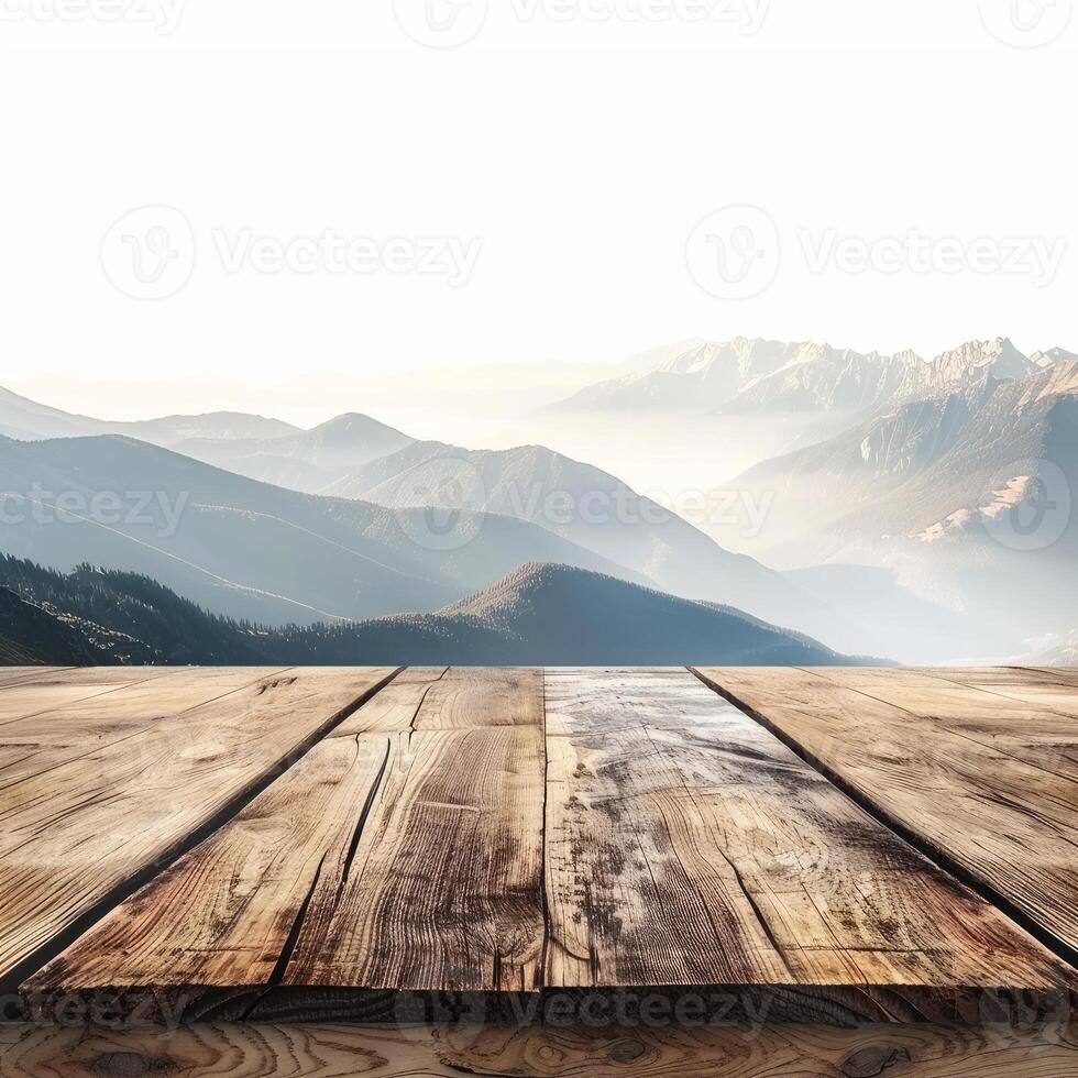 Empty wooden table displaying majestic mountain range at sunrise photo