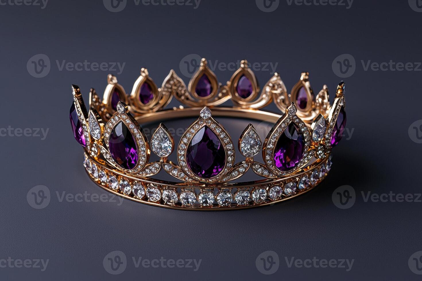 Close up of a jeweled crown with purple and clear gems photo