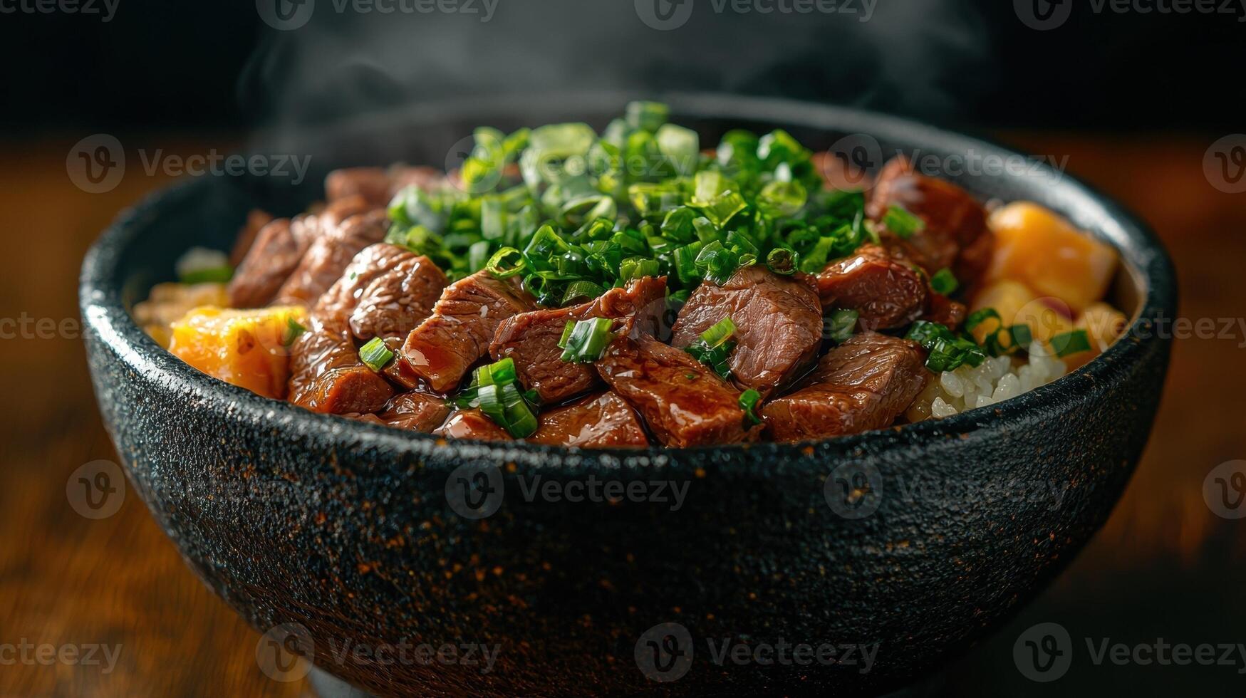 Delicious beef bowl with rice and spring onions photo