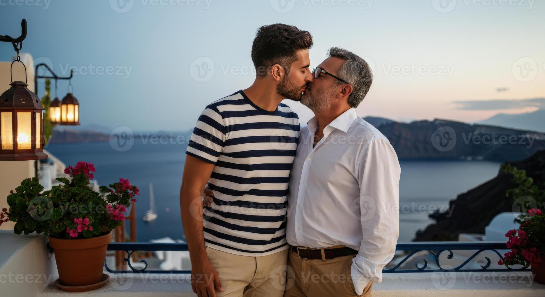 Romantic evening embrace of diverse couple on scenic waterfront balcony photo