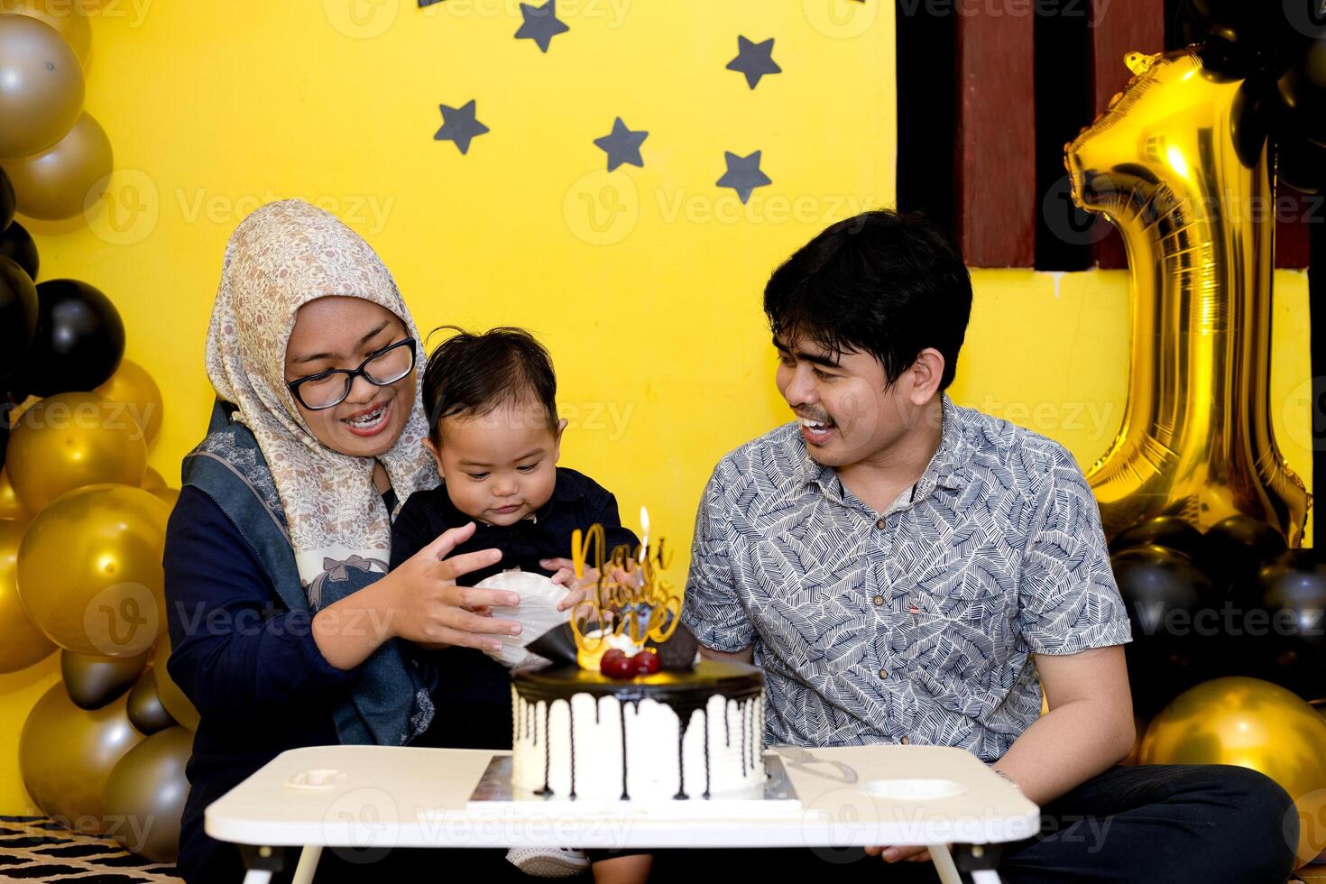 Mother, father and her first son enjoying photo