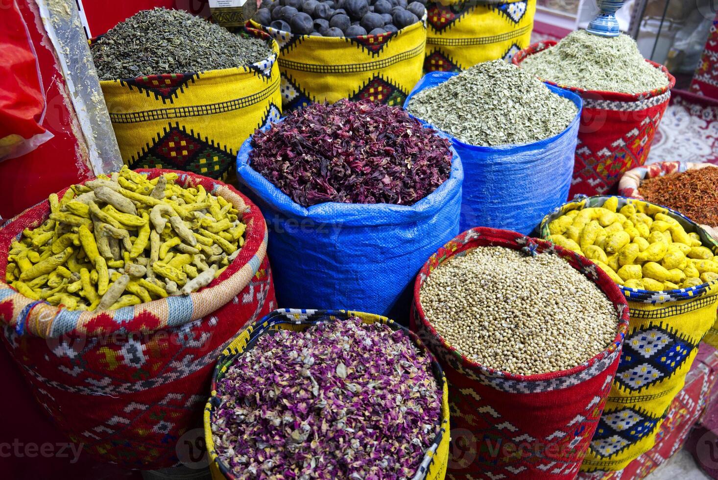 colorful baskets full of spices in a Middle Eastern souk photo
