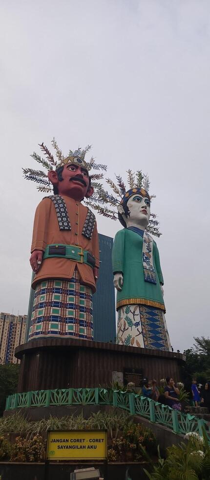 a pair of ondel ondel statues which are icons of Kemayoran photo